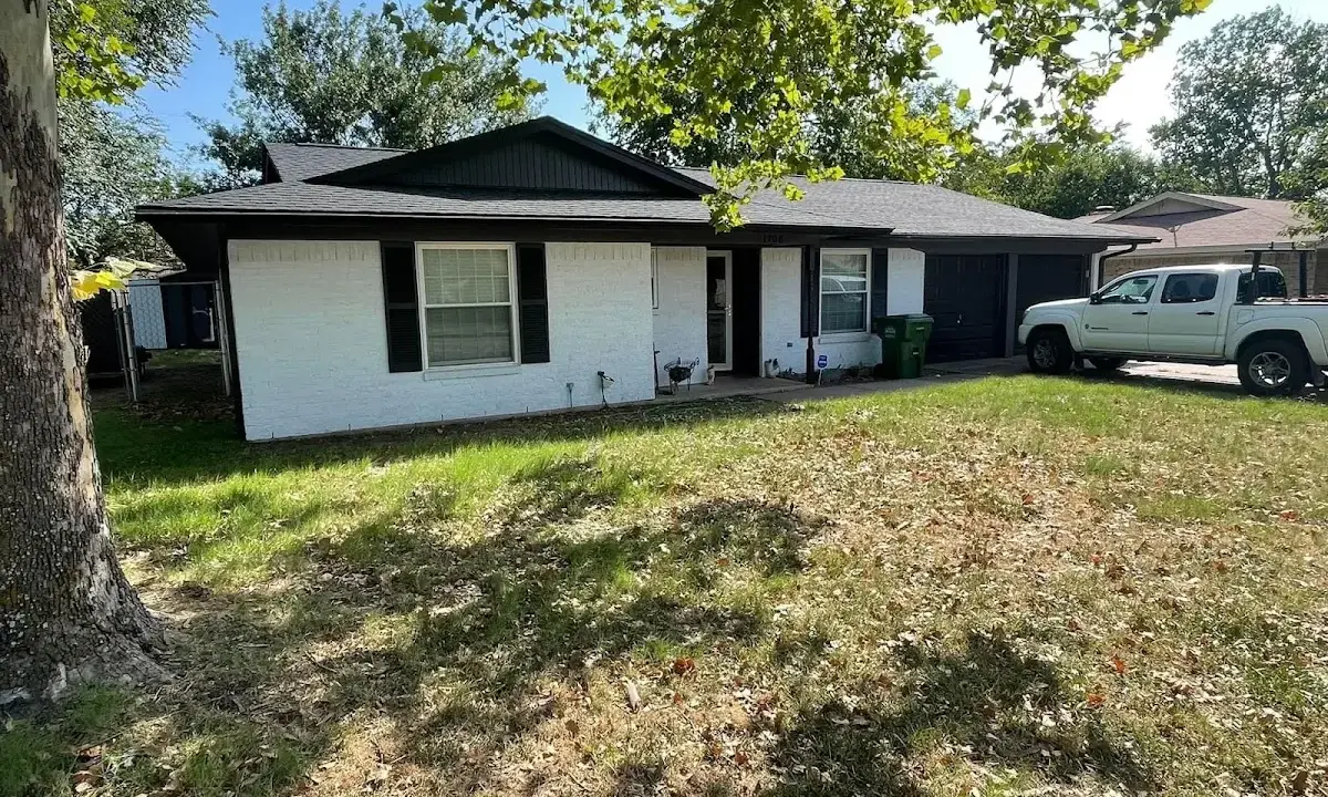 Professional roofing crew working on a residential roof in Accokeek